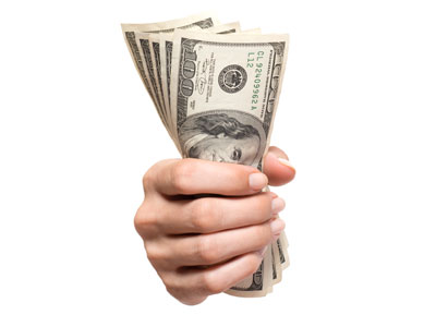 a hand holding money simbolizing financing 